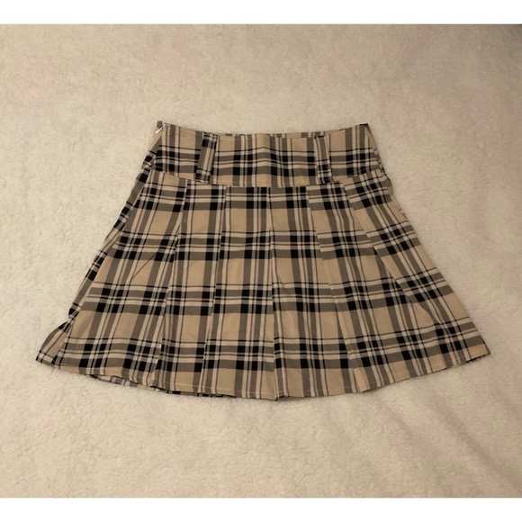 Pleaded skirts - Picture 1 of 8